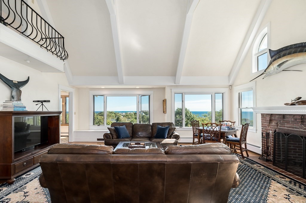 15 Cliff Road Gloucester, MA 01930 - Photo 10 of 42 a living room with fireplace furniture and a fireplace