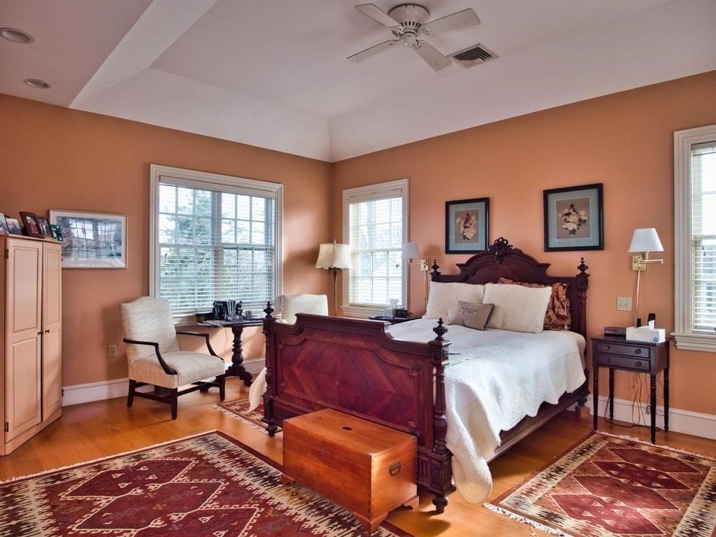1958 Main Road Westport, MA 02791 - Photo 12 of 28 a bedroom with a bed and wooden floor