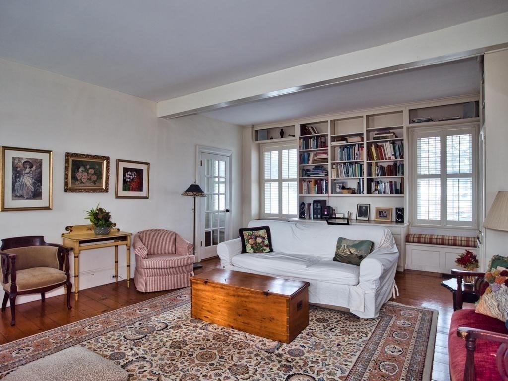 1958 Main Road Westport, MA 02791 - Photo 18 of 28 a living room with furniture and a window