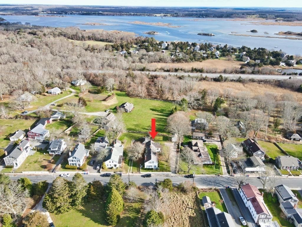 1958 Main Road Westport, MA 02791 - Photo 3 of 28 an aerial view of residential houses with outdoor space