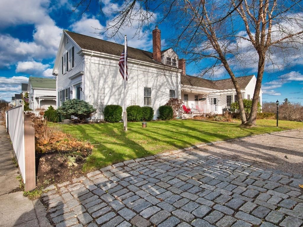 1958 Main Road Westport, MA 02791 - Photo 4 of 28 a view of a house with backyard and sitting area
