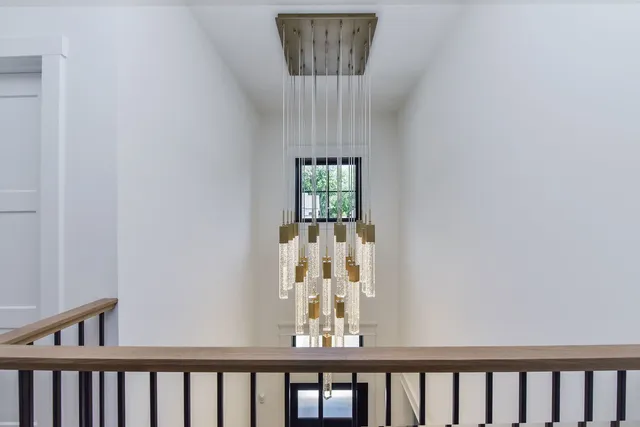 a spacious bathroom with a sink double vanity and a mirror