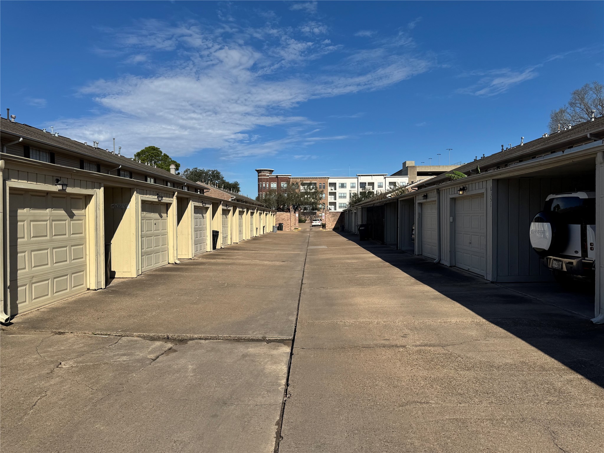 2041 Winrock Boulevard, Unit 157 Houston, TX 77057 - Photo 18 of 25 Extra wide alley behind the hom allows for easy access to the and maneuverability.