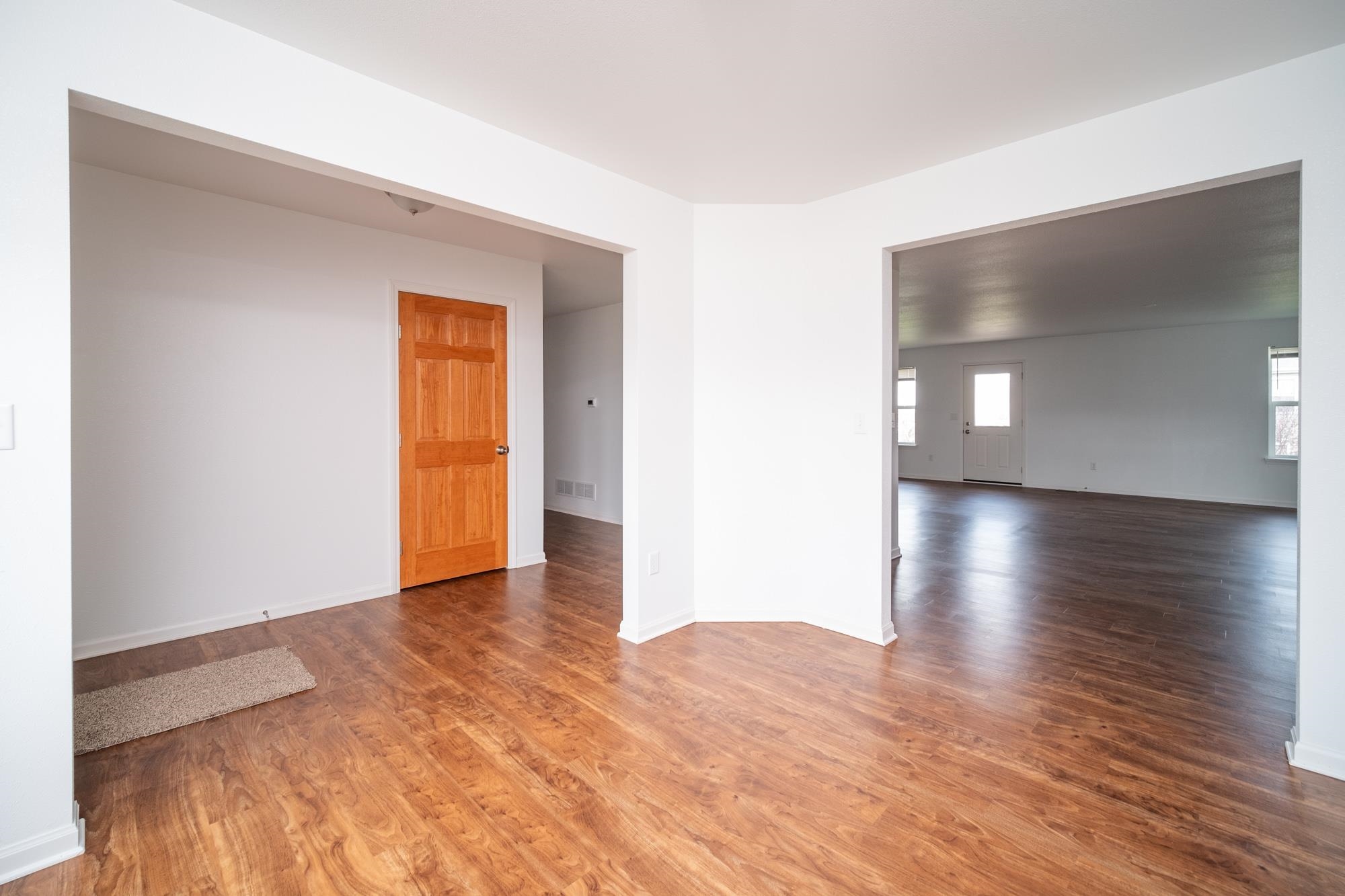 3030 Hiddengreen Drive Belvidere, IL 61008 - Photo 3 of 24 a view of a hallway with wooden floor