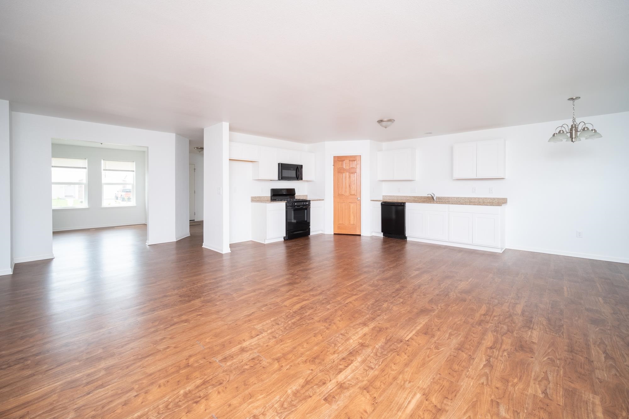 3030 Hiddengreen Drive Belvidere, IL 61008 - Photo 4 of 24 a view of a kitchen with a sink and a refrigerator