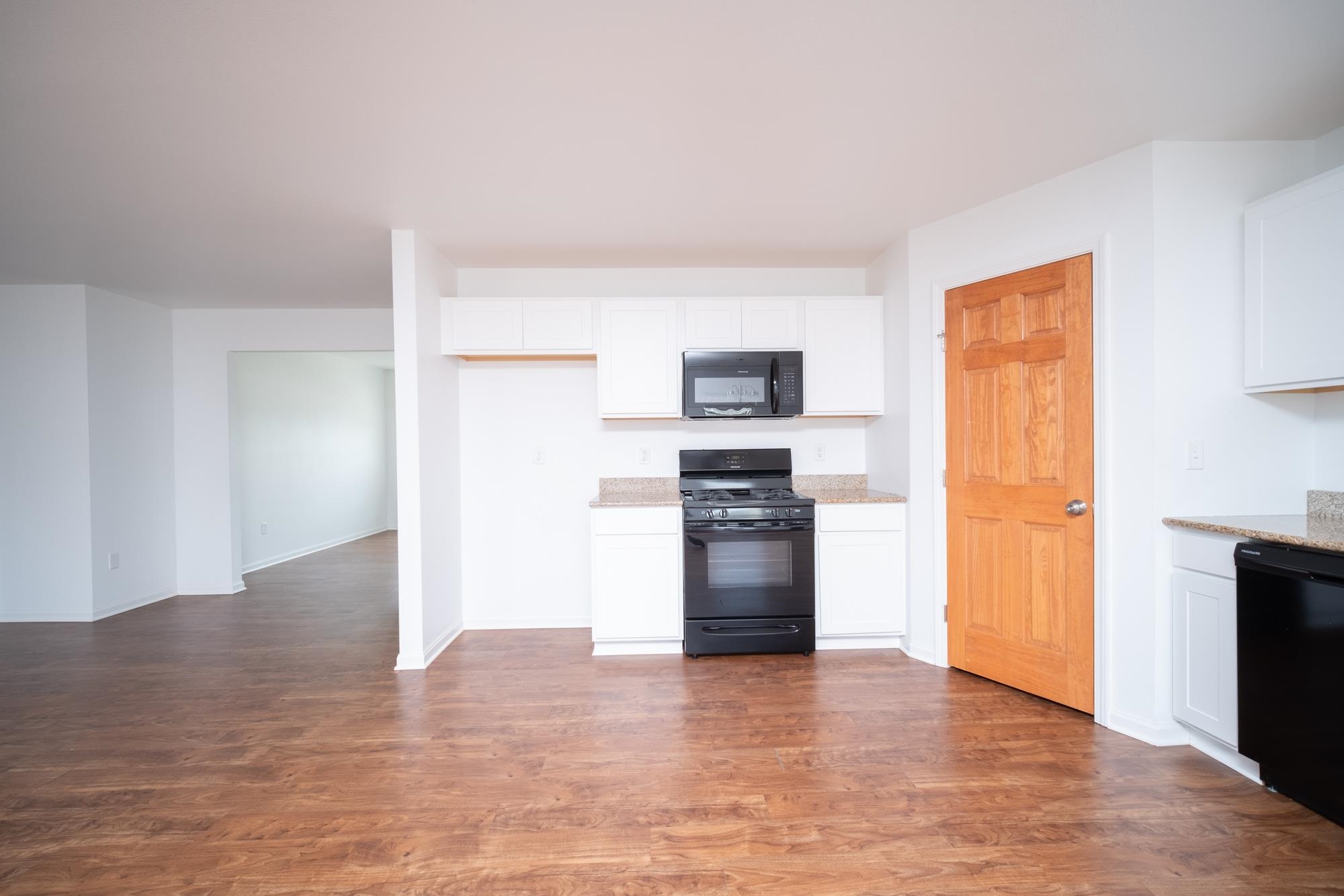 3030 Hiddengreen Drive Belvidere, IL 61008 - Photo 6 of 24 a view of a kitchen with a sink and a refrigerator