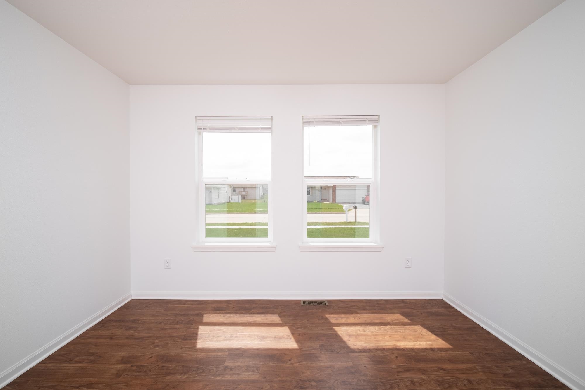 3030 Hiddengreen Drive Belvidere, IL 61008 - Photo 9 of 24 an empty room with windows
