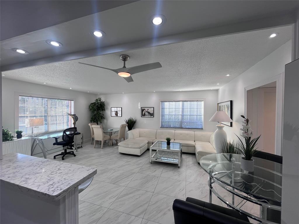 601 Southeast 5th Court, Unit 301 Fort Lauderdale, FL 33301 - Photo 17 of 28 a living room with furniture and wooden floor