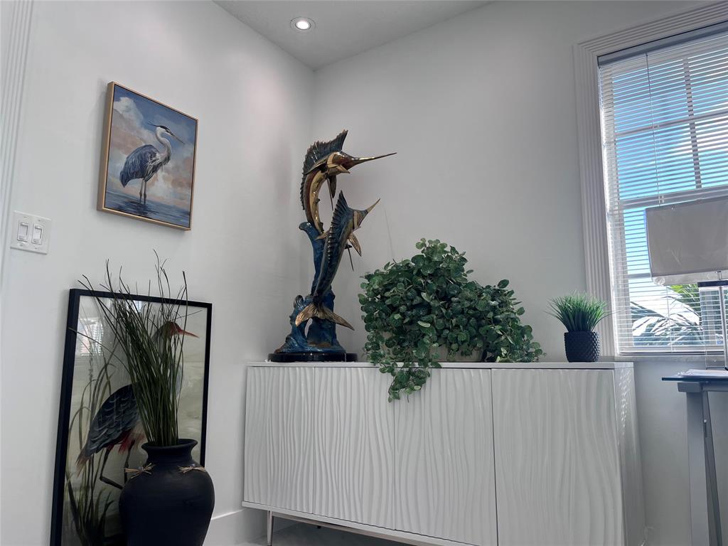 601 Southeast 5th Court, Unit 301 Fort Lauderdale, FL 33301 - Photo 6 of 28 a view of a hallway and a livingroom with furniture