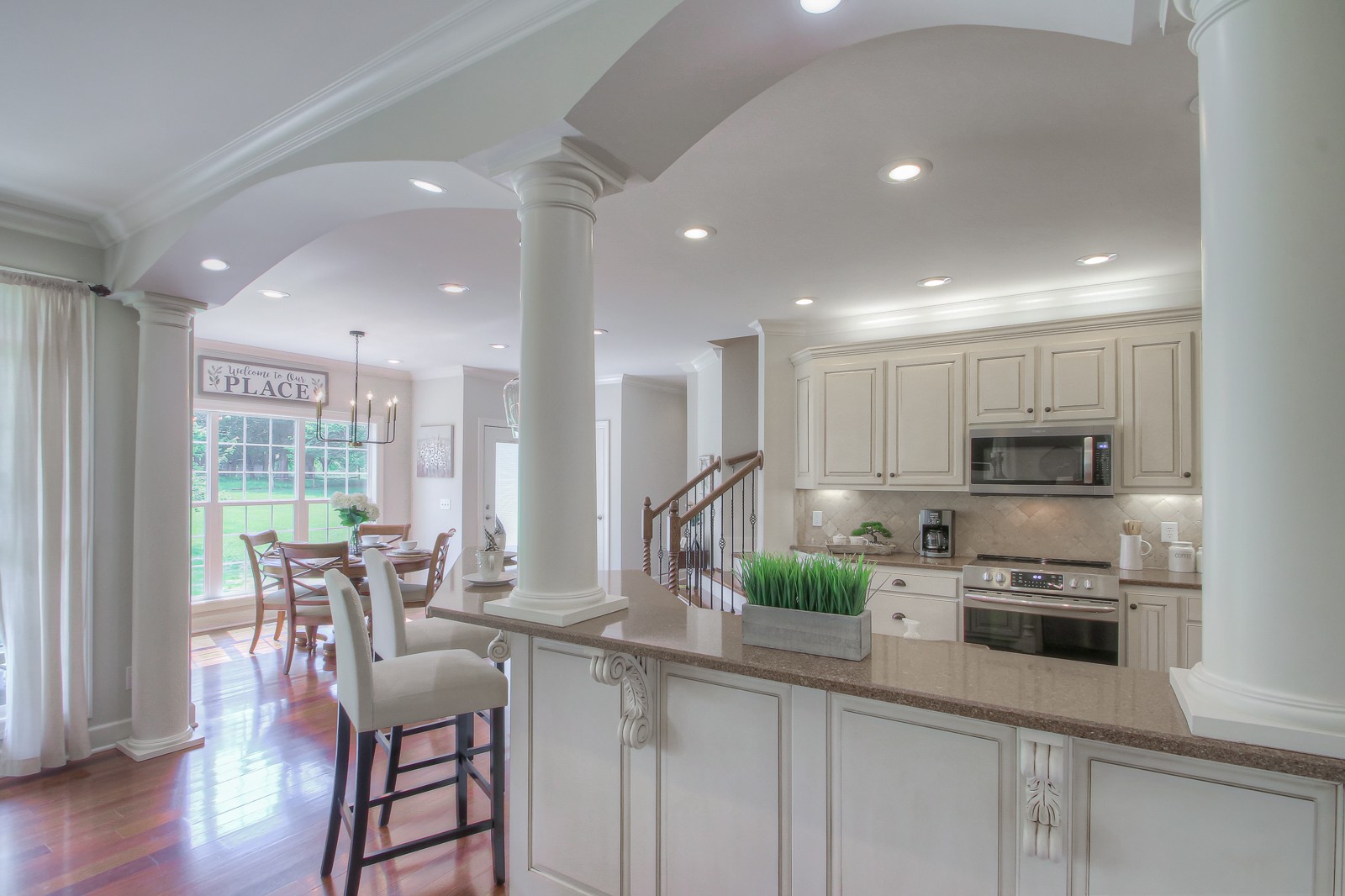 9251 Link Road Christiana, TN 37037 - Photo 15 of 40 a kitchen with granite countertop a stove a sink and a refrigerator