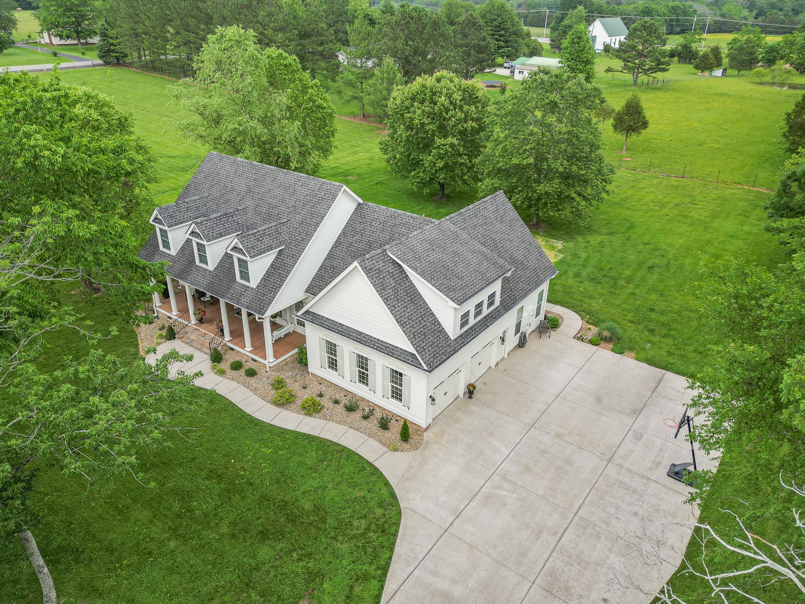 9251 Link Road Christiana, TN 37037 - Photo 2 of 40 an aerial view of a house with a garden