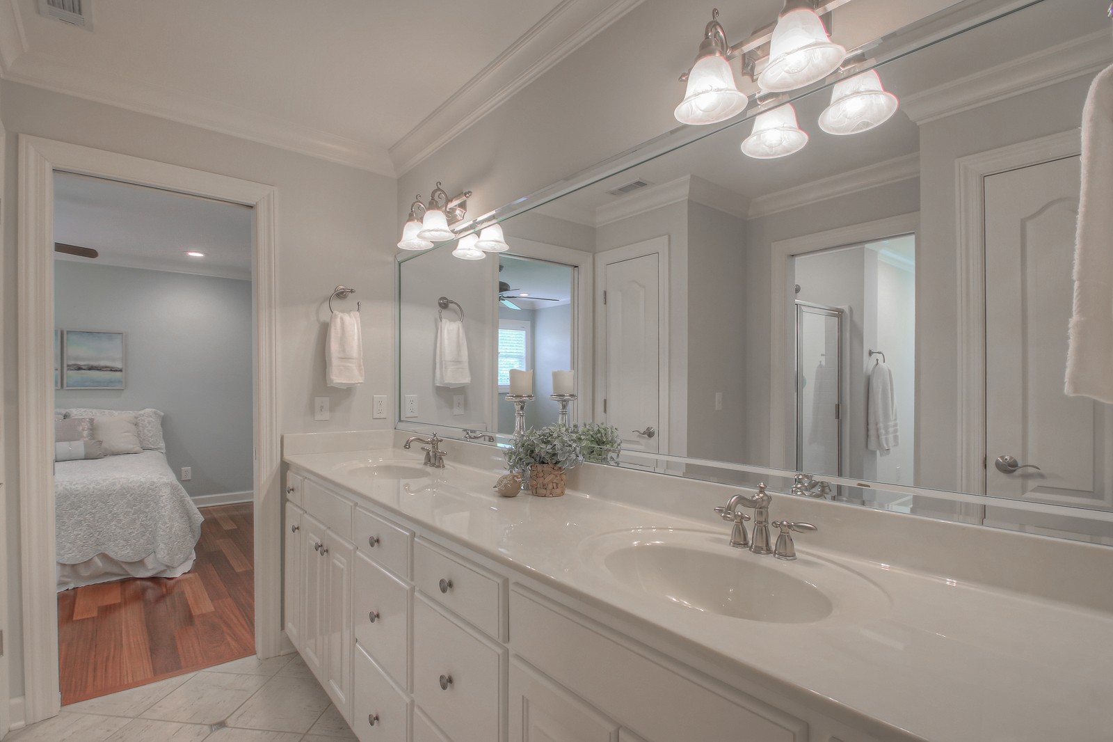 9251 Link Road Christiana, TN 37037 - Photo 27 of 40 a bathroom with a double vanity sink and a mirror