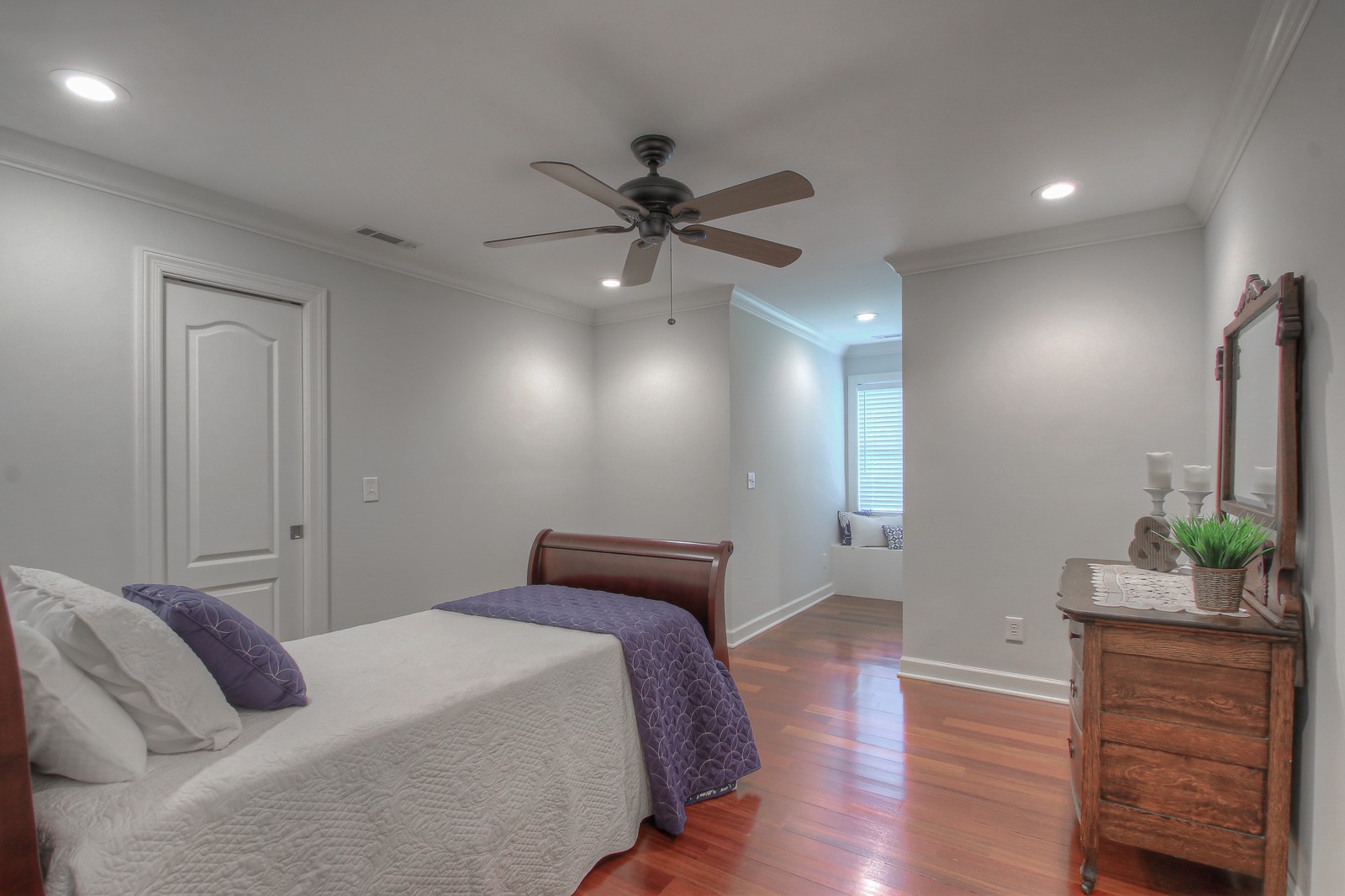 9251 Link Road Christiana, TN 37037 - Photo 29 of 40 a bedroom with a bed and a dresser with wooden floor