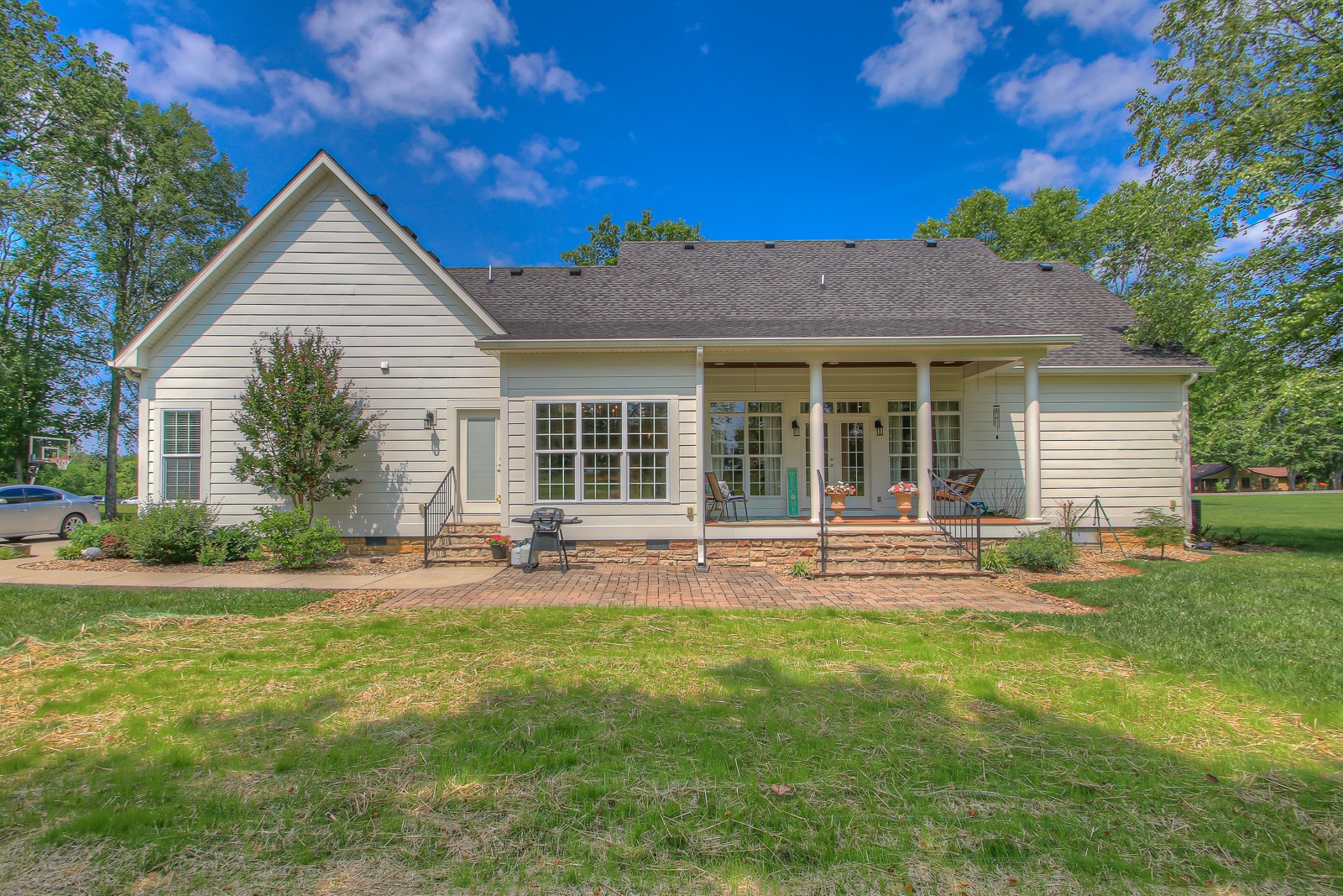 9251 Link Road Christiana, TN 37037 - Photo 39 of 40 a front view of a house with a yard and outdoor seating