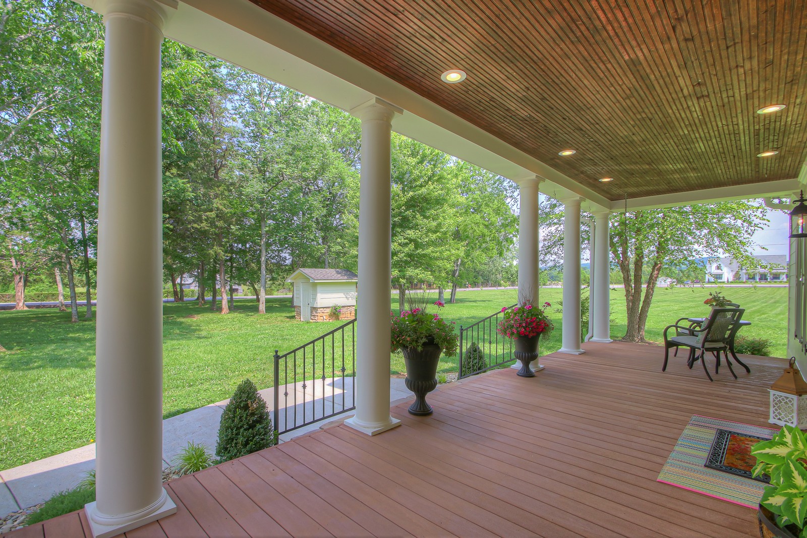 9251 Link Road Christiana, TN 37037 - Photo 7 of 40 a view of a patio with table and chairs floor to ceiling window with wooden floor