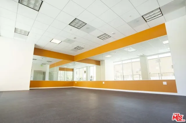 a room with furniture and a flat screen tv