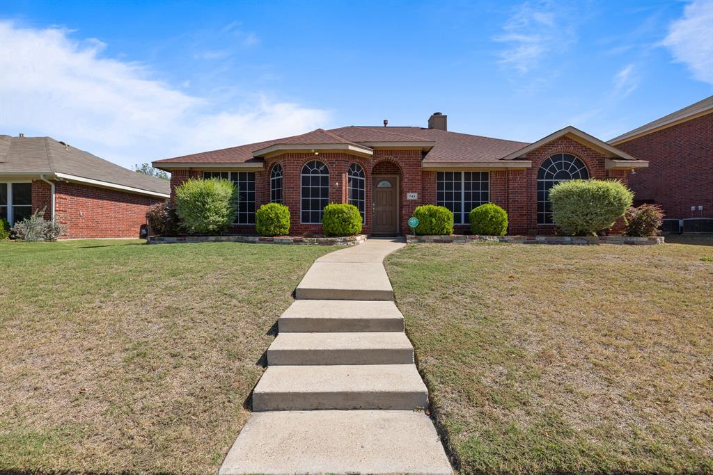 741 Cheyenne Drive Allen, TX 75002 - Photo 1 of 1 a front view of a house with a yard