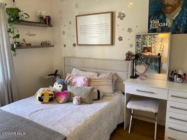 a bathroom with a toilet sink and shower