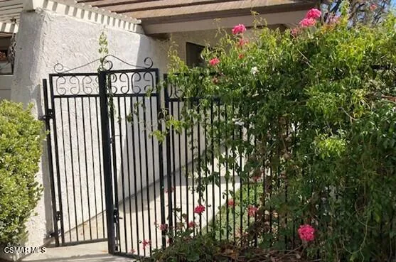 a front view of a house having yard