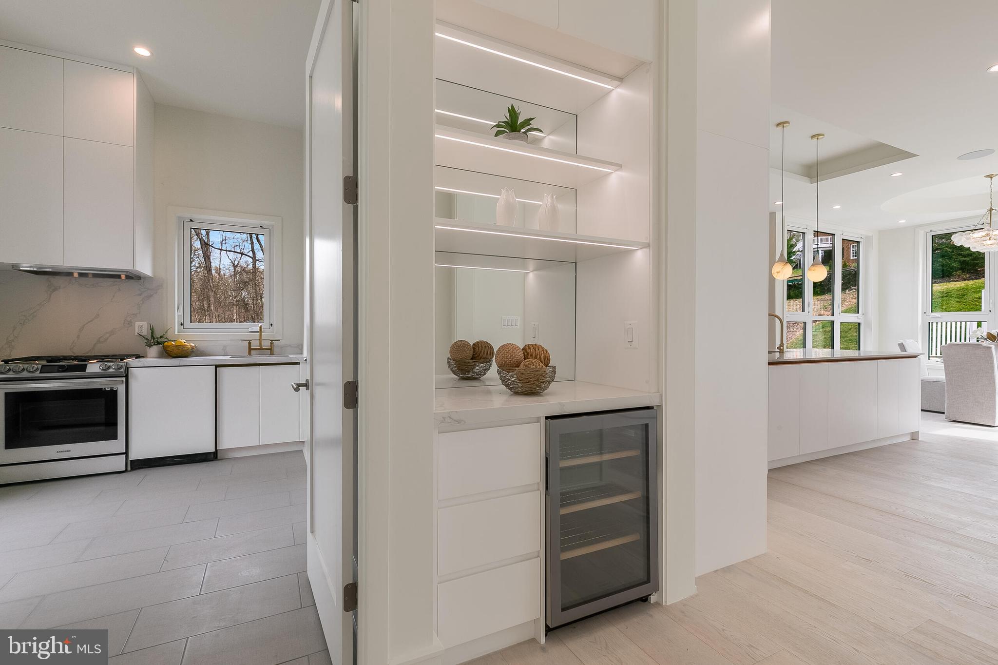 8757 Brook Road McLean, VA 22102 - Photo 21 of 51 a kitchen with cabinets and window