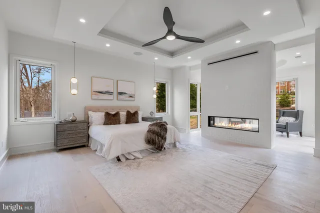 a bed room with furniture and wooden floor