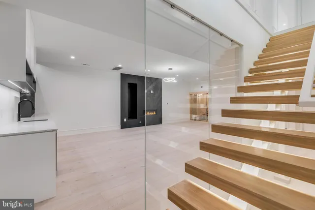 a view of staircase with white walls