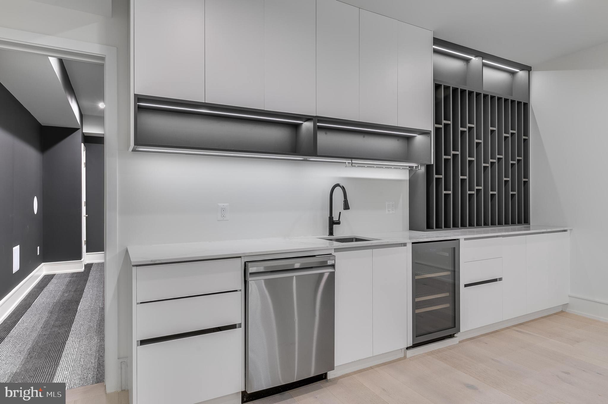 8757 Brook Road McLean, VA 22102 - Photo 45 of 51 a close view of a sink and a stove in a kitchen