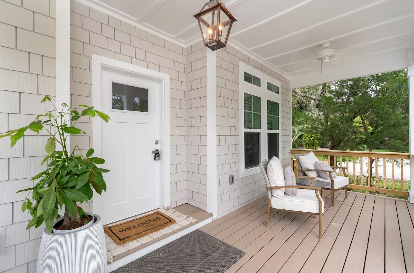600 Twenty-First Street St. Augustine, FL 32084 - Photo 25 of 32 a balcony with furniture and potted plants