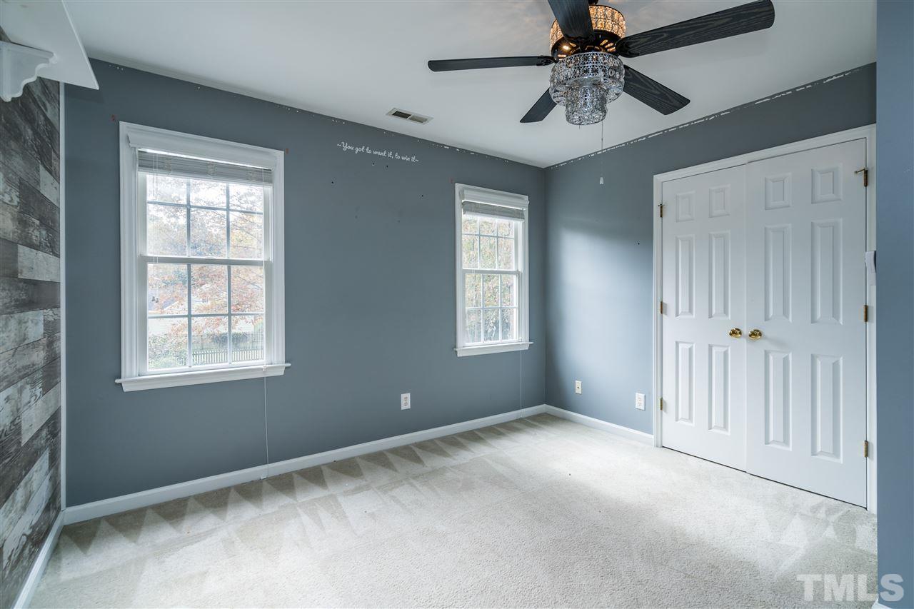 501 Woodland Road Raleigh, NC 27603 - Photo 23 of 28 a view of an empty room with a window