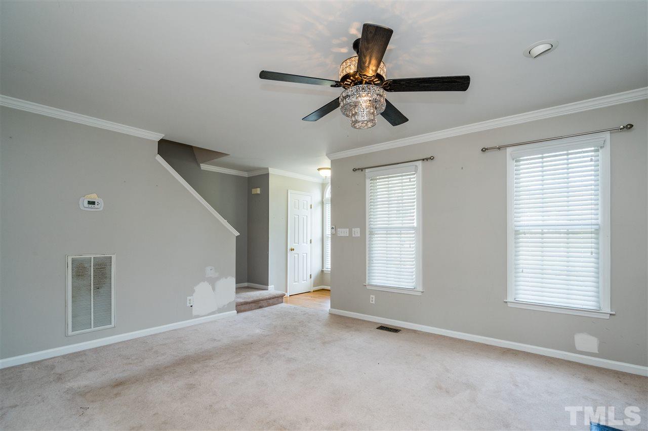 501 Woodland Road Raleigh, NC 27603 - Photo 10 of 28 a view of an empty room with a window