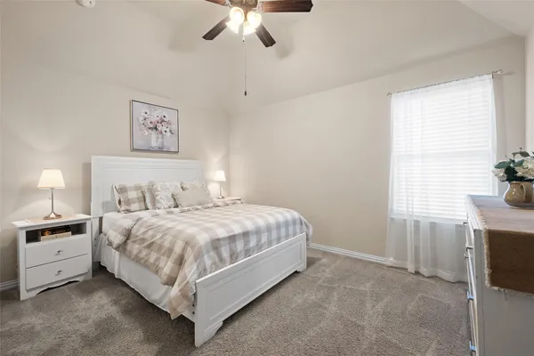 a view of an empty room with a closet