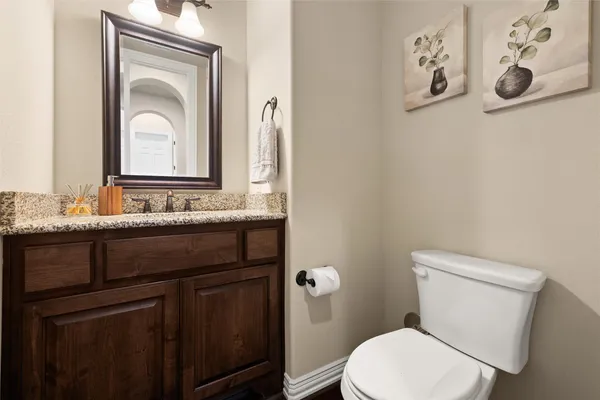 a utility room with sink dryer and washer