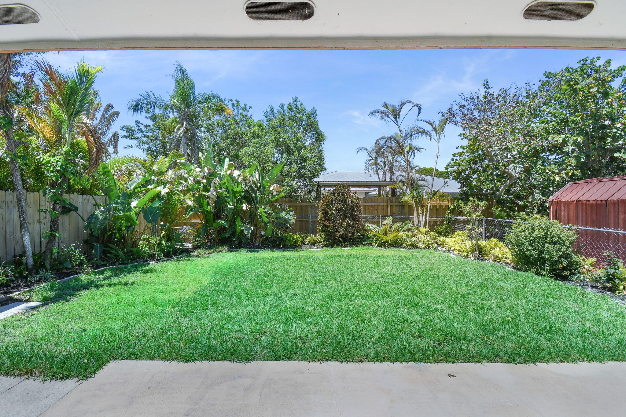 9040 Southeast Hobe Ridge Avenue Hobe Sound, FL 33455 - Photo 14 of 46 Back Yard