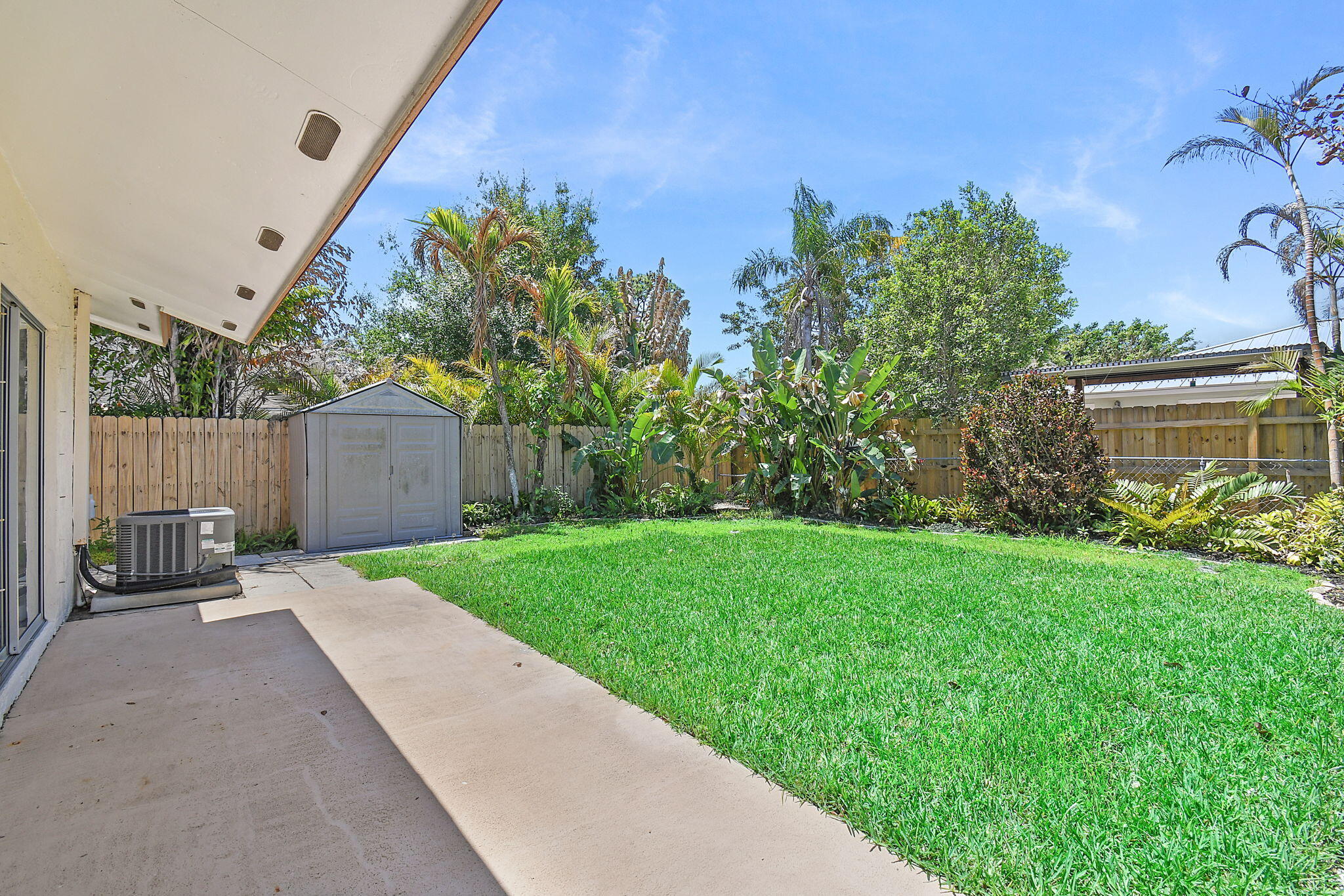 9040 Southeast Hobe Ridge Avenue Hobe Sound, FL 33455 - Photo 16 of 46 Back Yard