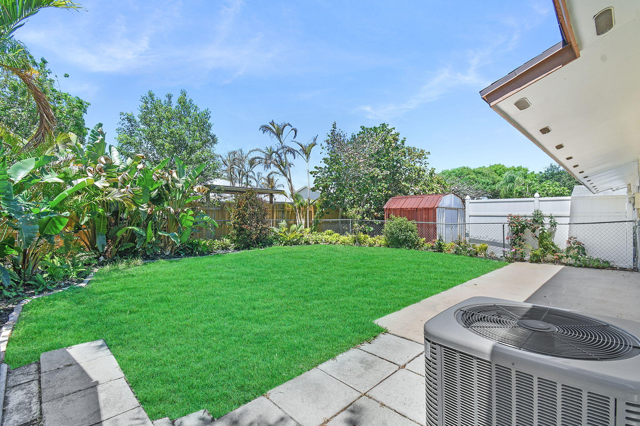 9040 Southeast Hobe Ridge Avenue Hobe Sound, FL 33455 - Photo 17 of 46 Back Yare