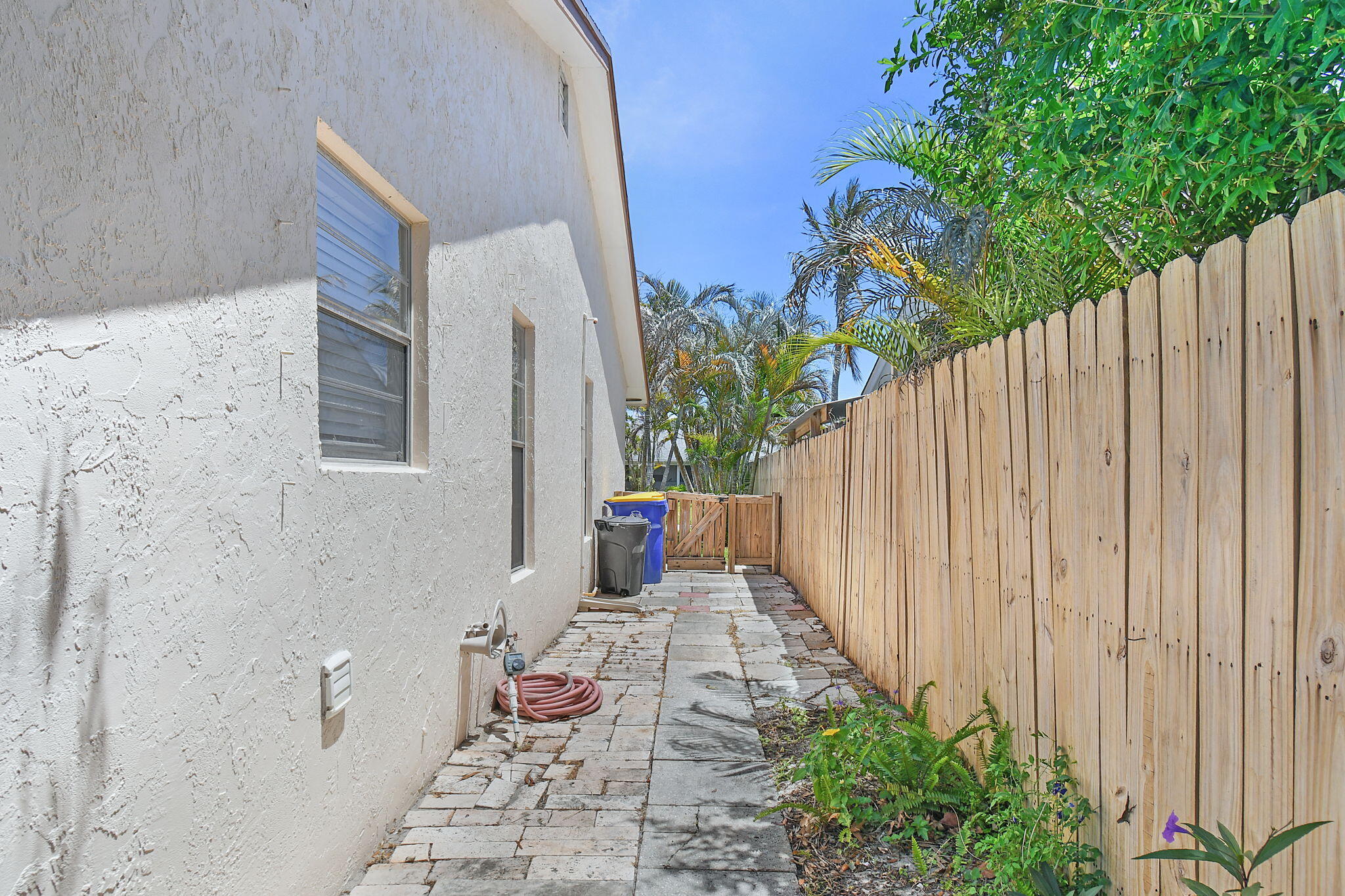 9040 Southeast Hobe Ridge Avenue Hobe Sound, FL 33455 - Photo 18 of 46 Side Area