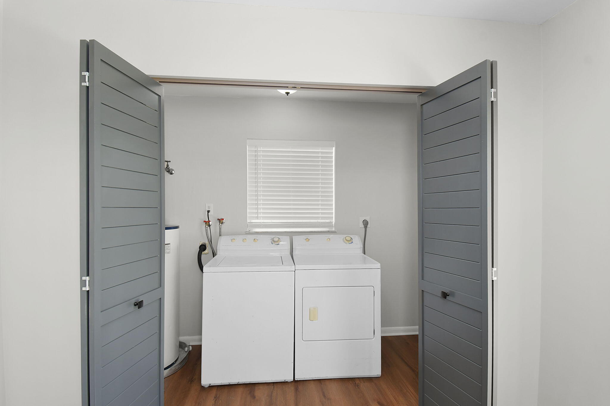 9040 Southeast Hobe Ridge Avenue Hobe Sound, FL 33455 - Photo 26 of 46 Utility Closet