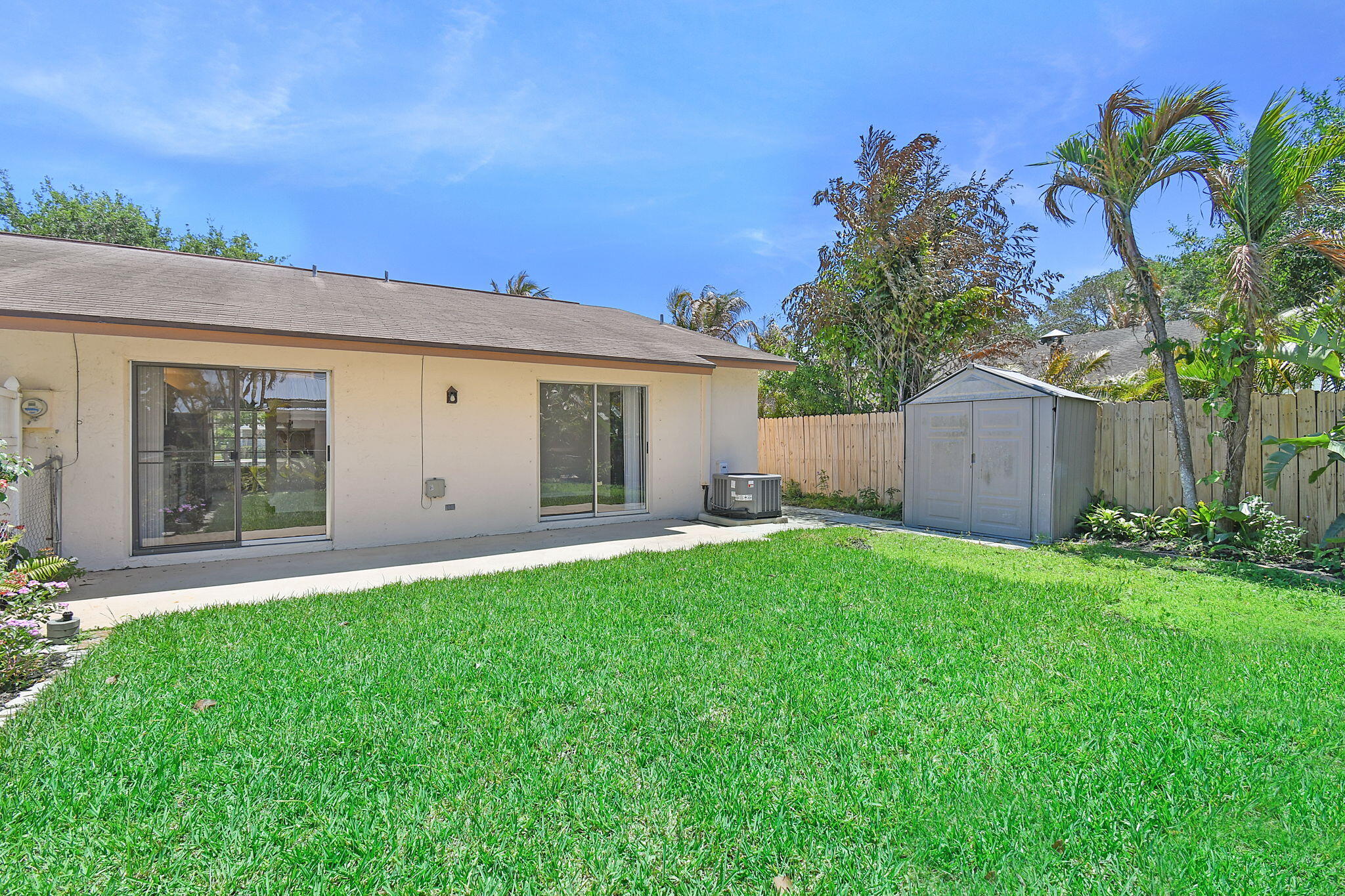 9040 Southeast Hobe Ridge Avenue Hobe Sound, FL 33455 - Photo 3 of 46 Back View