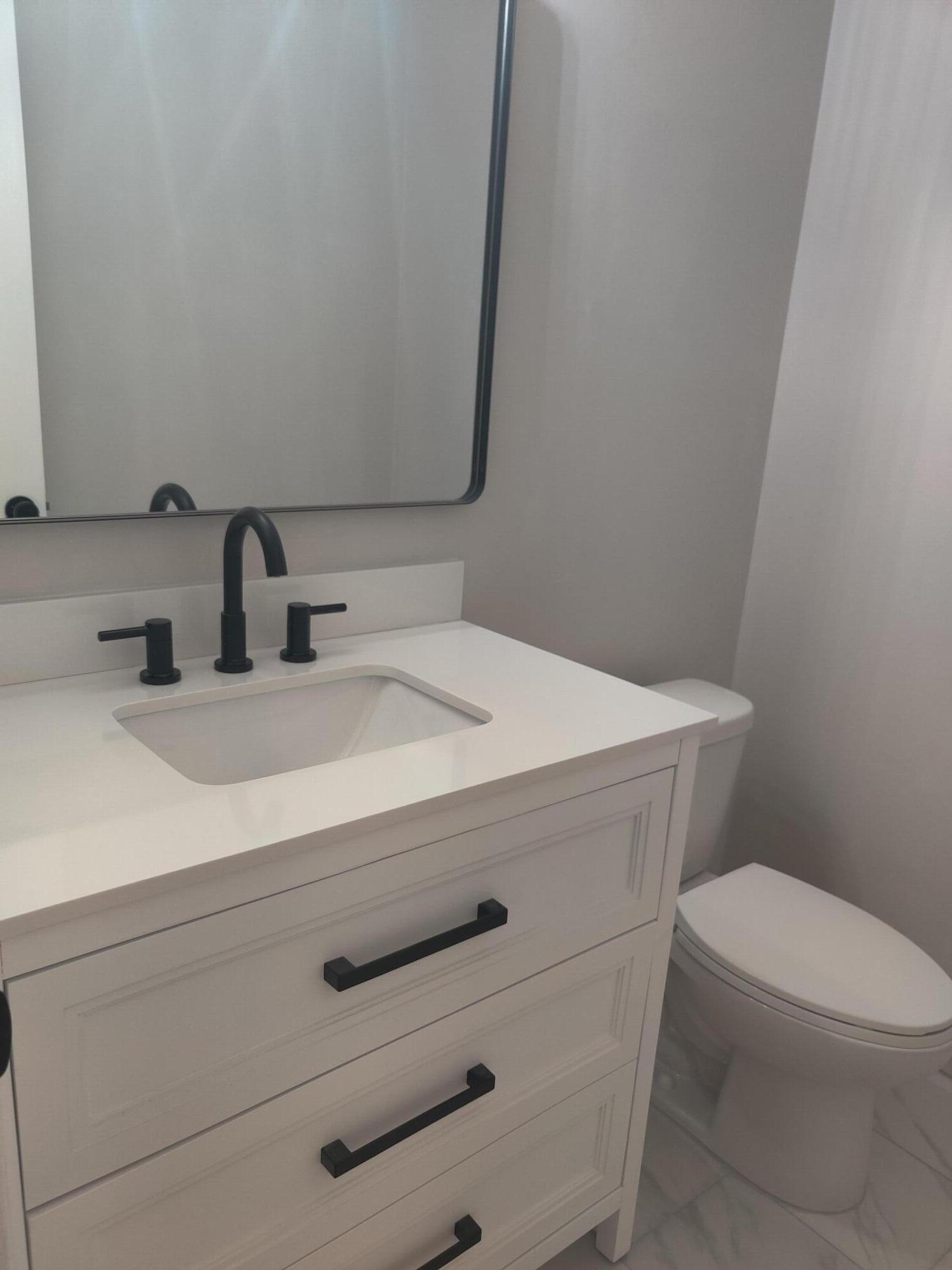 9040 Southeast Hobe Ridge Avenue Hobe Sound, FL 33455 - Photo 7 of 46 Half Bath
