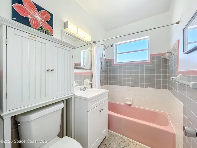 a hallway with washer and dryer