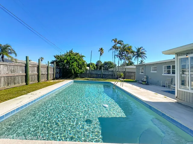 a view of a room with a washer and dryer