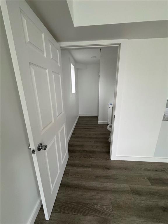 216 East Jackson Street Houston, PA 15342 - Photo 13 of 14 a view of a hallway with wooden floor and staircase