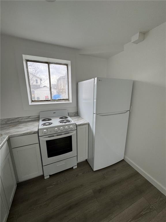216 East Jackson Street Houston, PA 15342 - Photo 10 of 14 a stove top oven sitting inside of a kitchen