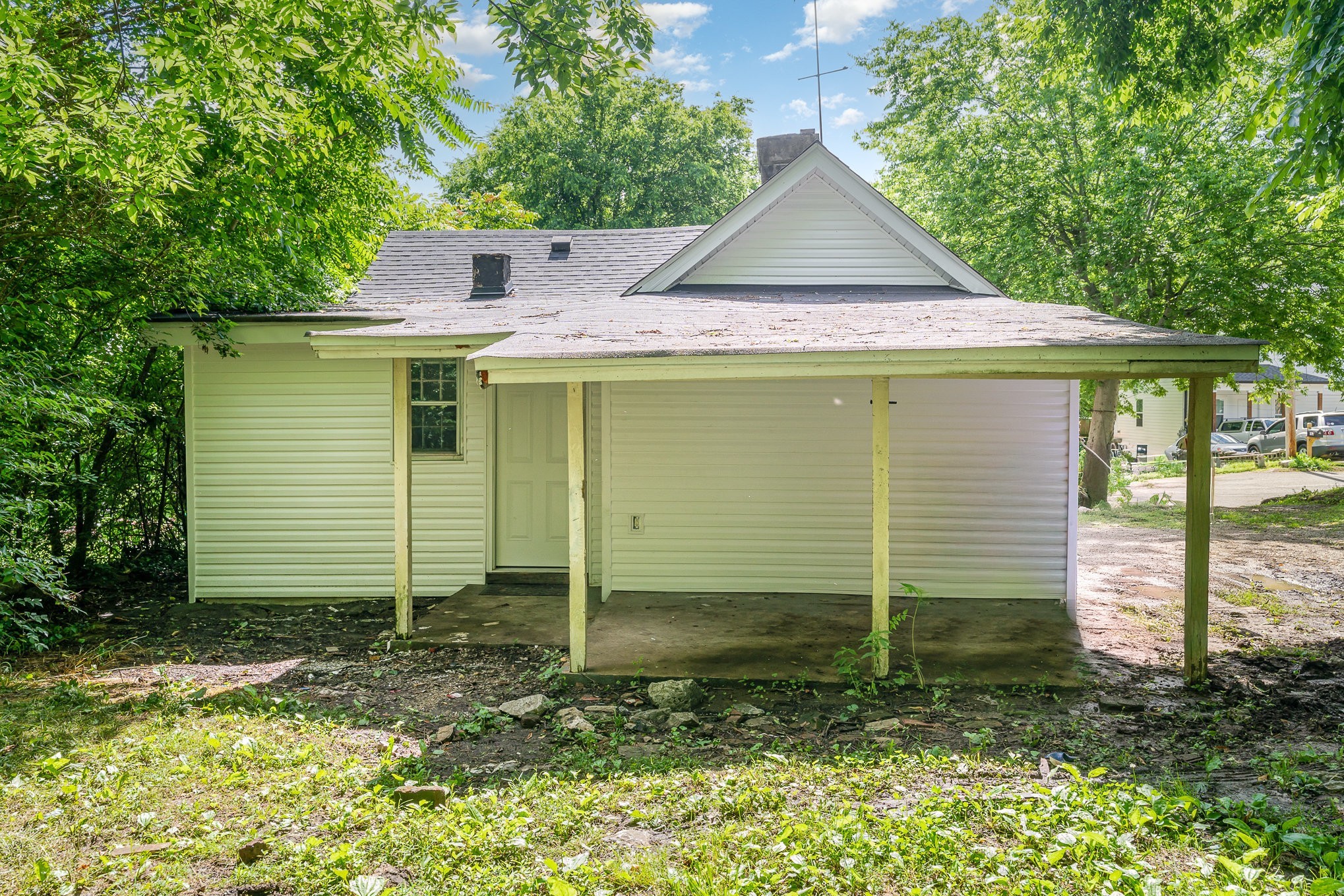 1018 Bridge Street Columbia, TN 38401 - Photo 17 of 18 a front view of a house with a yard