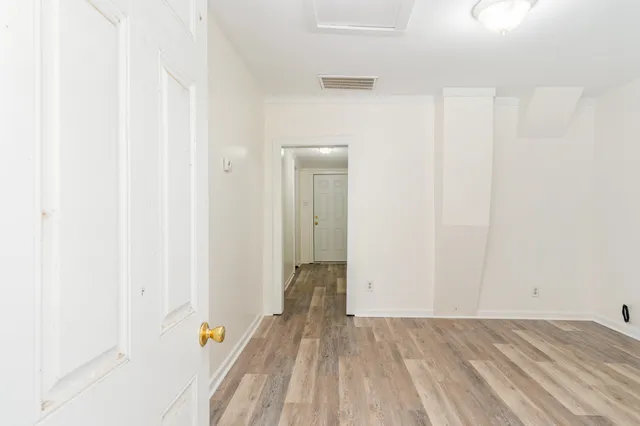a view of hallway with closet