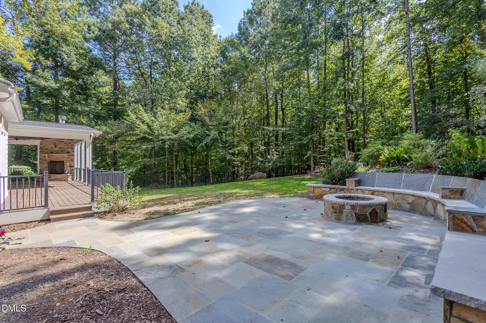 2729 Sunnystone Way Raleigh, NC 27613 - Photo 32 of 37 Custom Bluestone Patio & Firepit