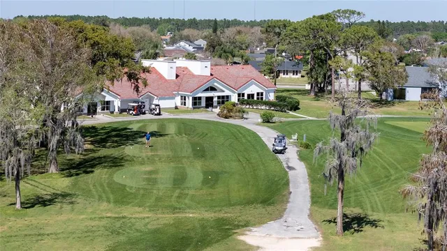 an aerial view of residential houses and outdoor space