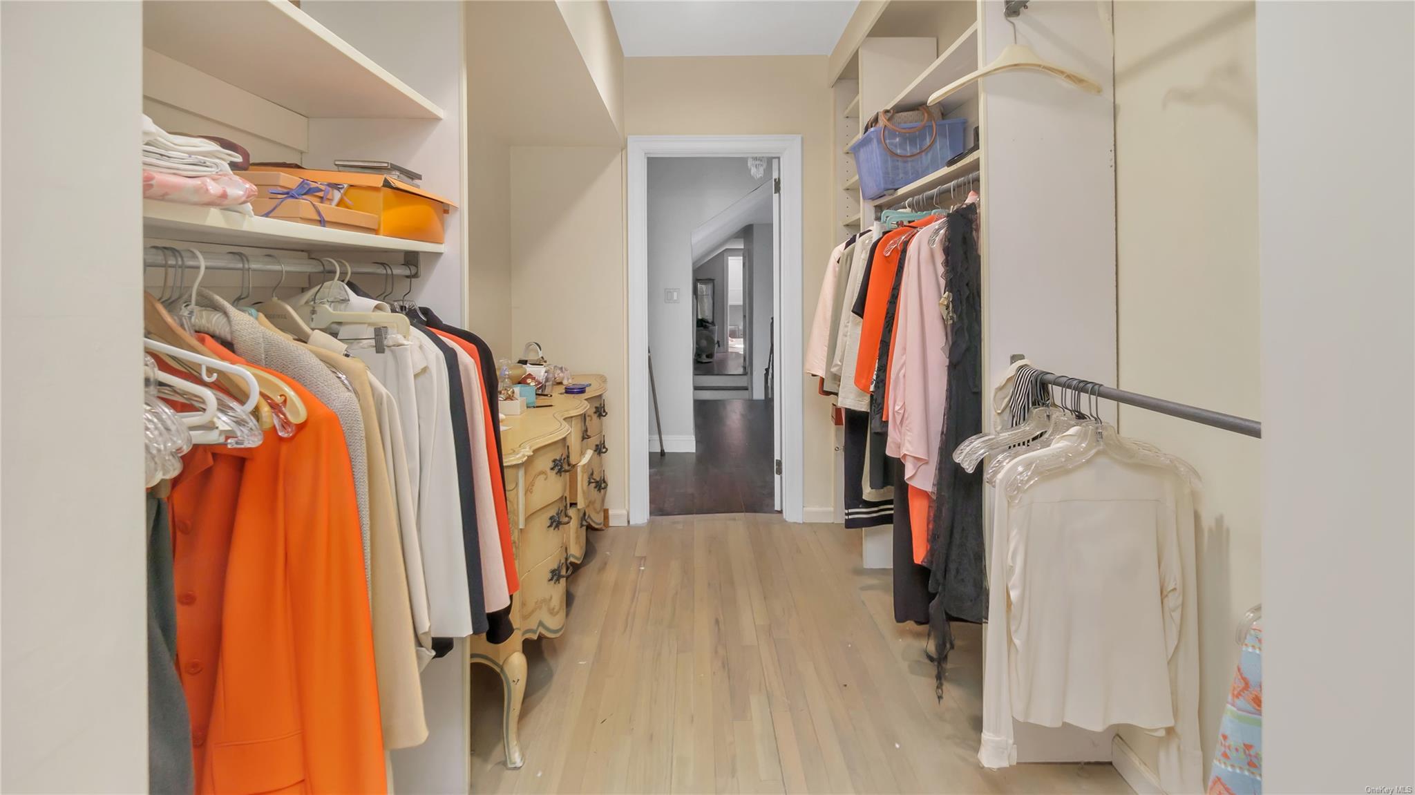 1230 Harbor Road Hewlett, NY 11557 - Photo 17 of 27 a view of walk in closet with clothes and shoes