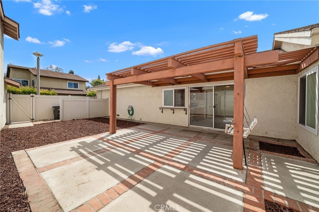 14272 Raintree Road Tustin, CA 92780 - Photo 16 of 24 a view of a backyard