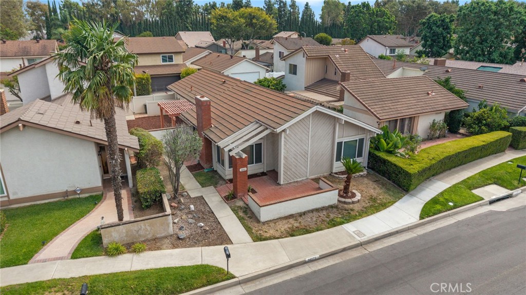 14272 Raintree Road Tustin, CA 92780 - Photo 18 of 24 an aerial view of a house with a yard